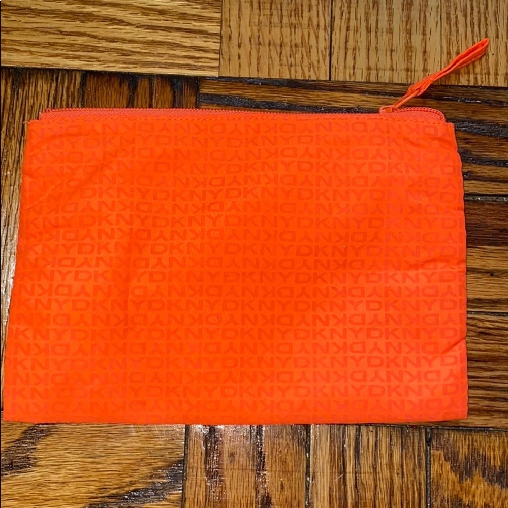 DKNY orange zippered pouch